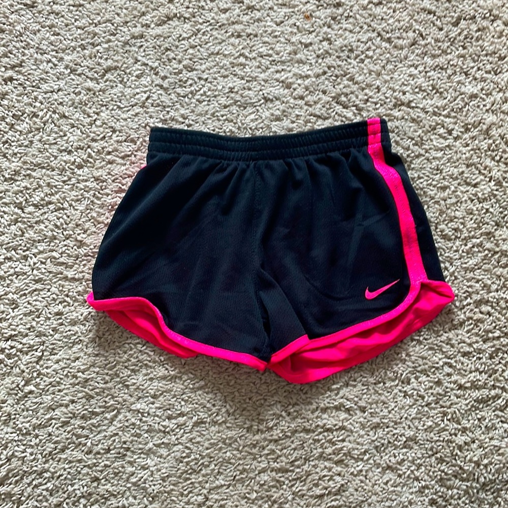 Black and hot pink girls Nike shorts